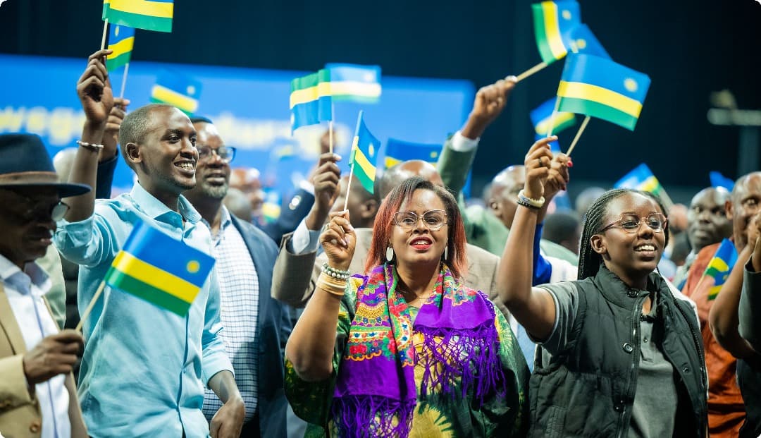 Rwandans celebrating with flags